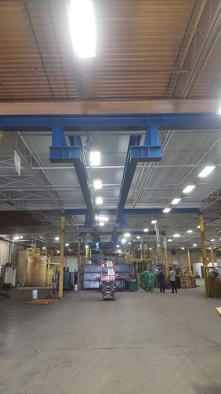 blue steel frame in manufacturing room