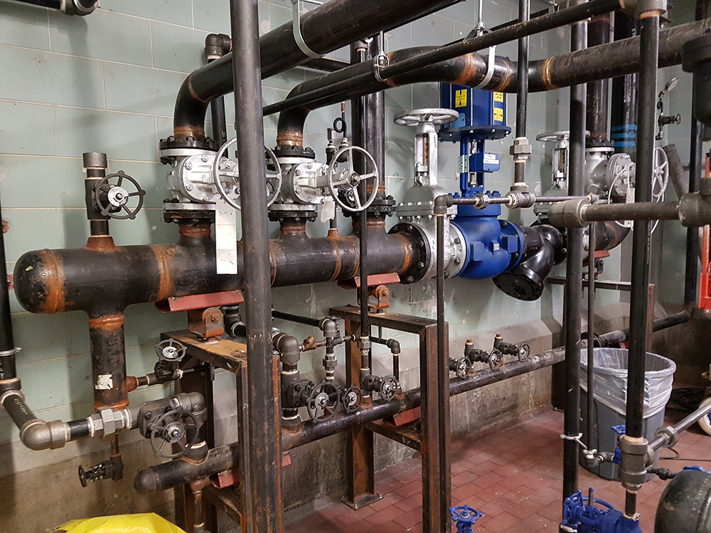 boiler room with blue pipes