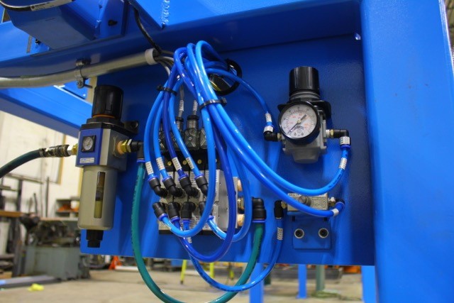 blue machinery and tubing